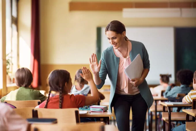 Teacher with students